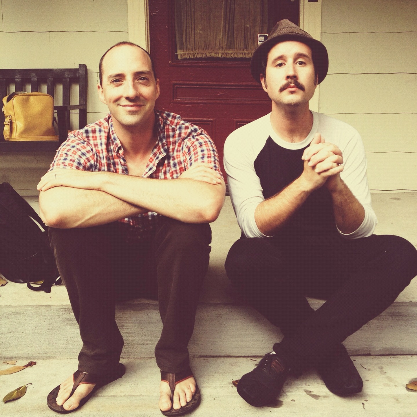 Victor Huckabee and Tony Hale sitting together on a porch