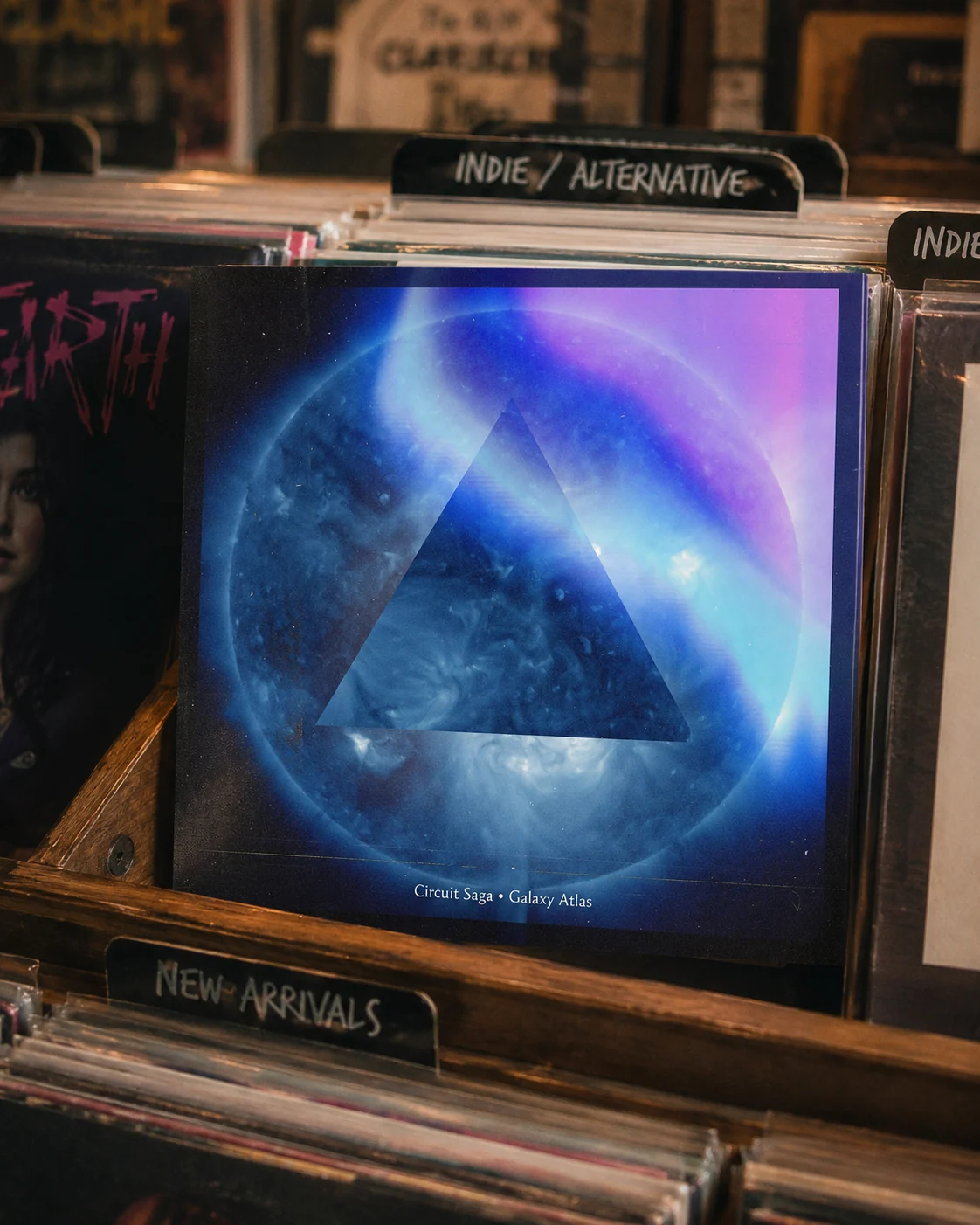 Circuit Saga album displayed beside audio equipment