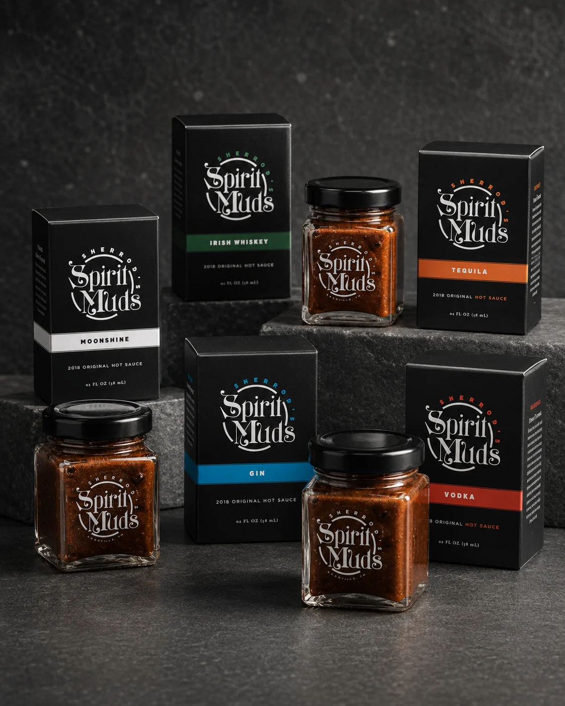 Collection of Spirit Muds jars and cartons